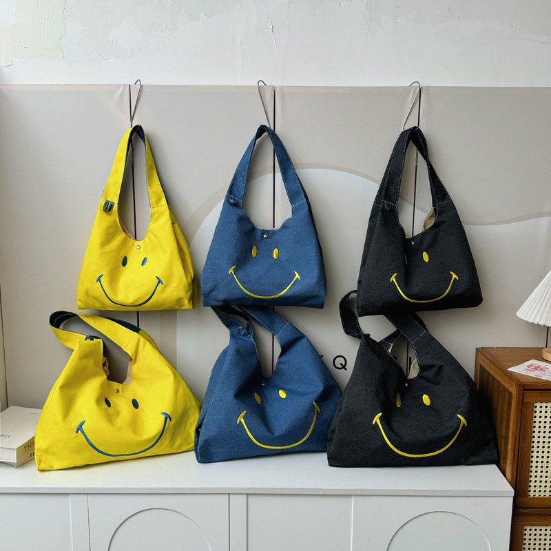 Versión coreana del popular bolso de hombro para niños y niñas, lindo y lindo bolso de mensajero para niños sonriente, estilo occidental, bolso para niños de gran capacidad