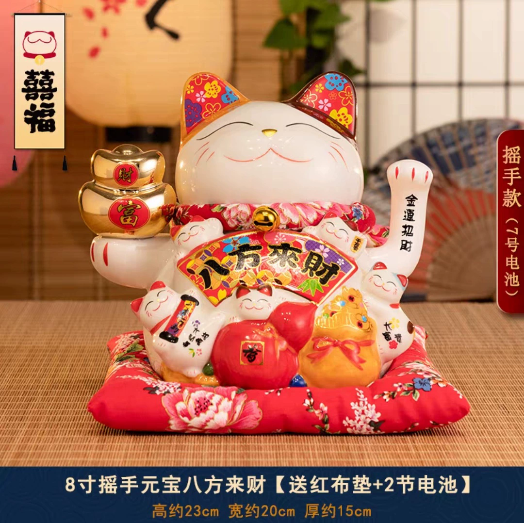 7 -inch wealth cat ornament shakes hands.