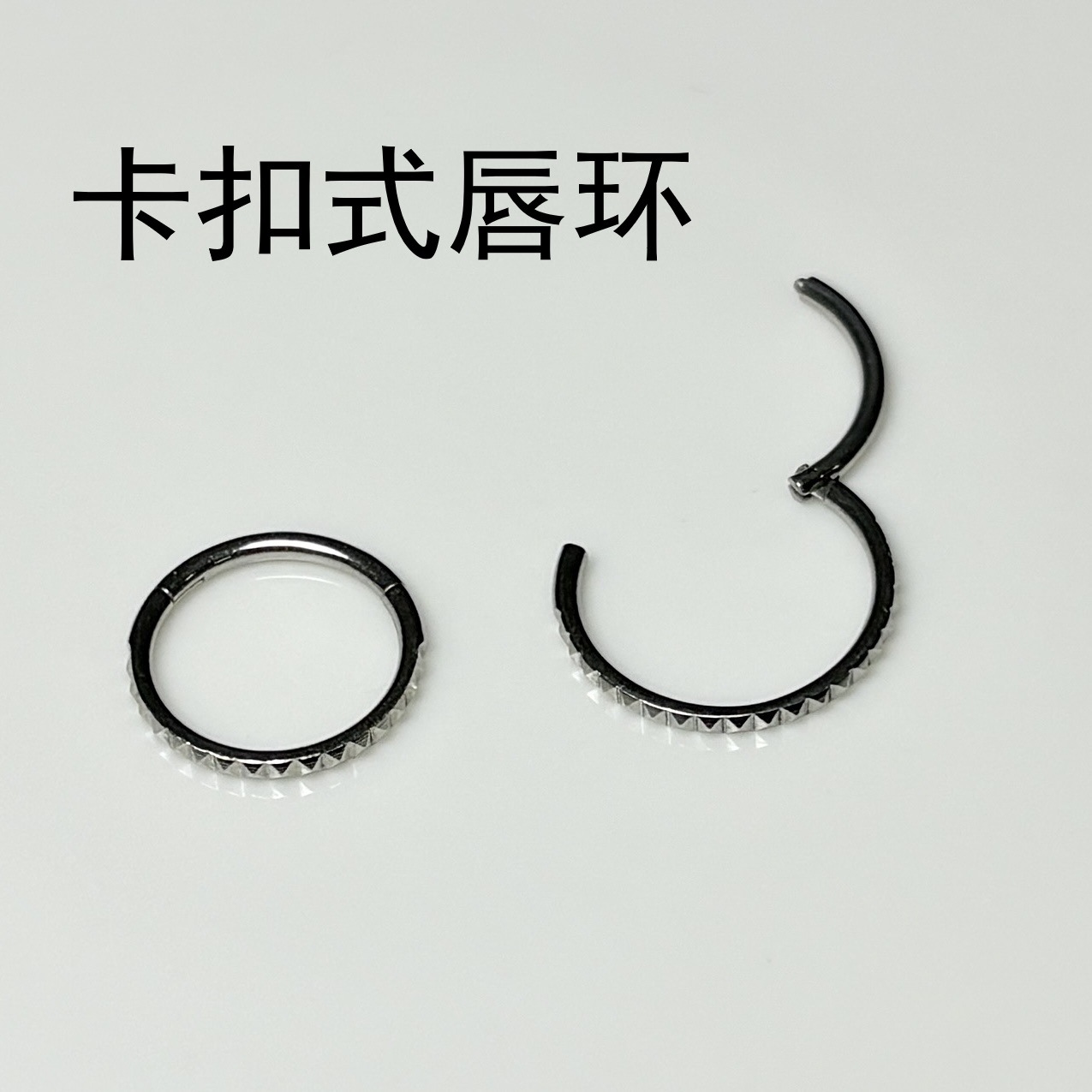 Silver pointed spike labret stud material detail