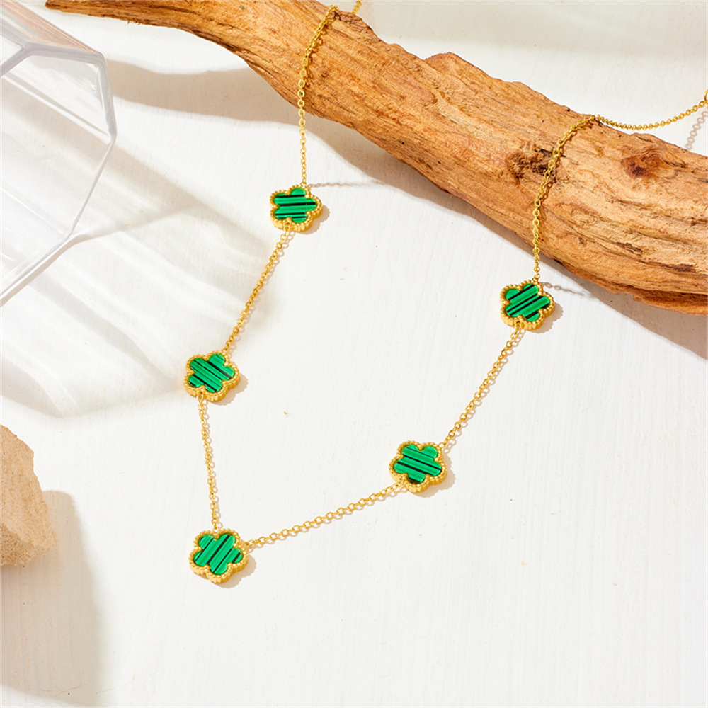 Nueva moda europea y americana no-desvanecimiento de acero de titanio de cinco hojas serie de trébol de moda de lujo ligero espárragos pulsera collar traje