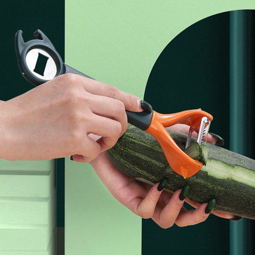 Kitchen tool creative three-in-one paring knife multi-functional peeler vegetable and fruit peeling and shredding grater