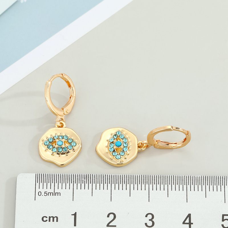 Fashion Irregular Round Rhinestones Devil's Eyes Copper Earrings display picture 2