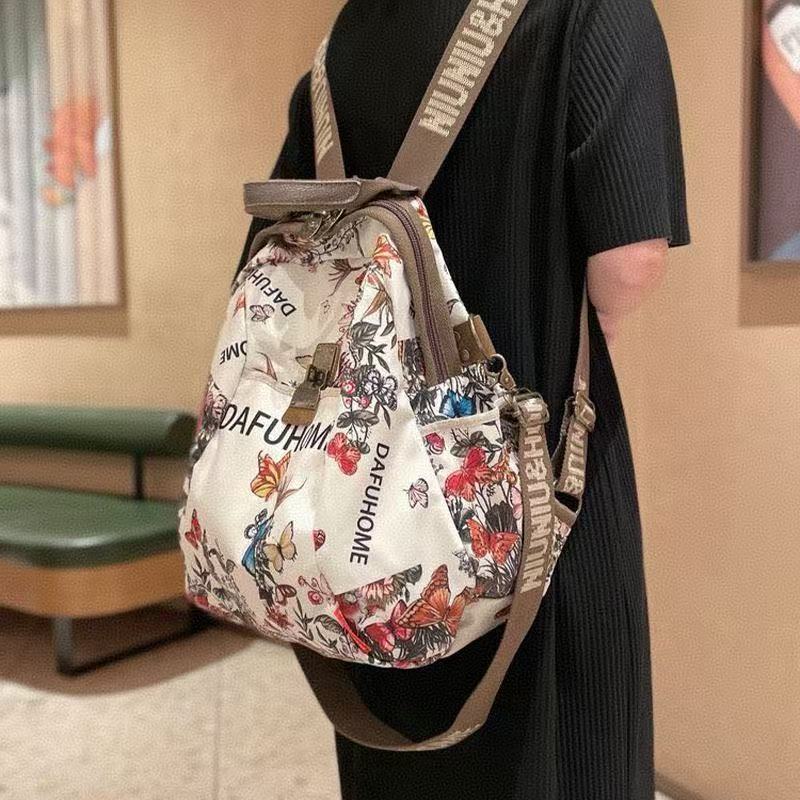 Perezoso viento alto valor de la cara explosivo estilo de moda extranjero anti-sucio damas mochila de viento 2025 mochila de viaje