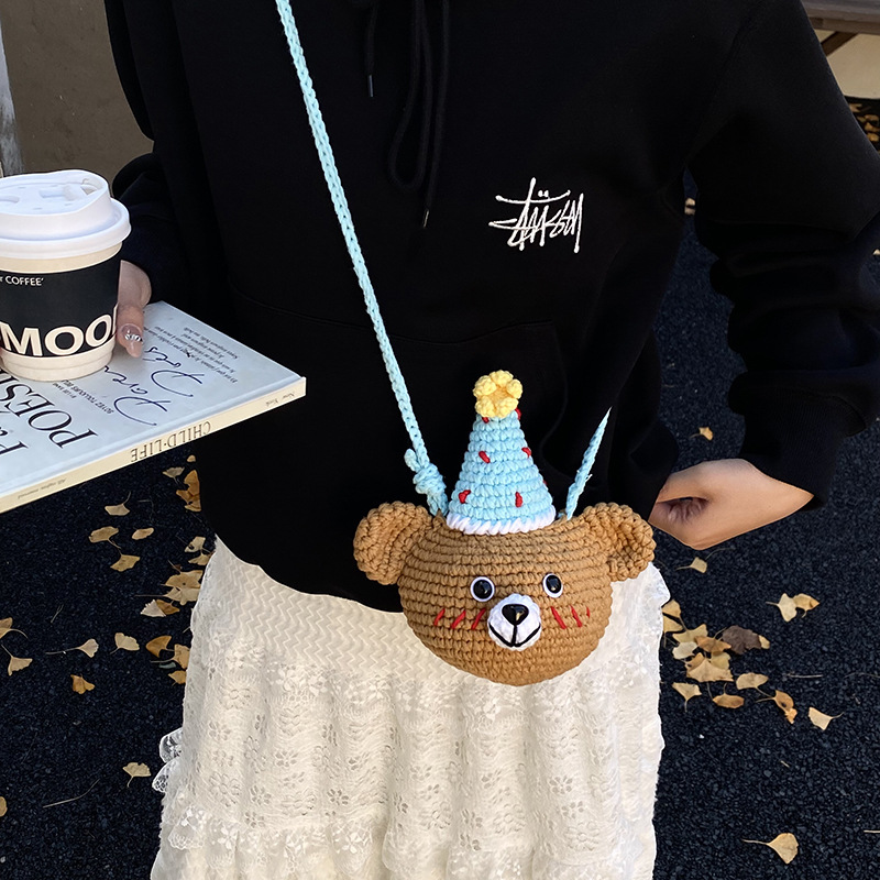 Bolsa de accesorios para niños tejidos de lana hechos a mano adorable oso pequeño bolso de cambio de bebé otoño y invierno nuevo mini mochila