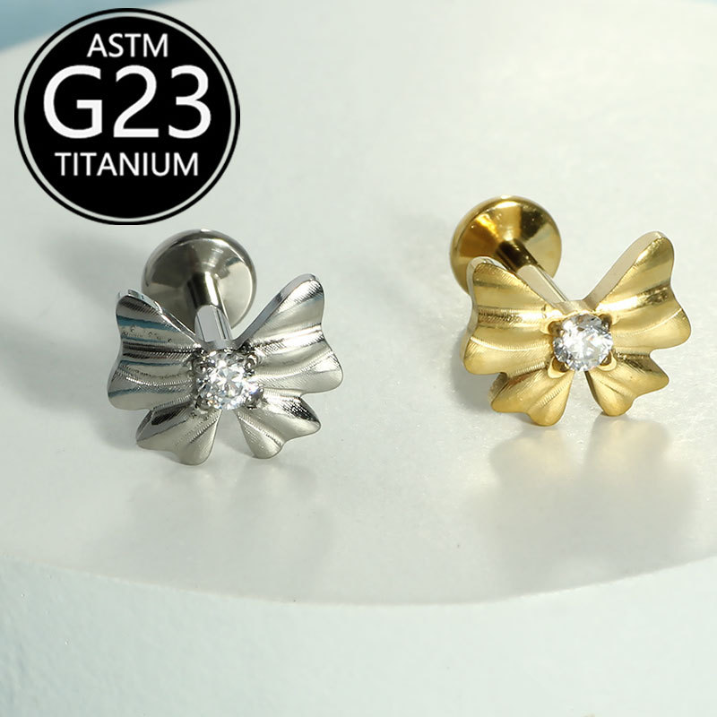Silver pointed spike labret stud material detail
