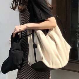 帆布斜跨大包女2026ins小众设计拼接撞色抽绳麻料手提单肩旅行包