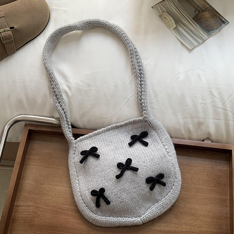 Bolsa de mano de mujer otoño / invierno nuevo estilo coreano atmósfera arco rojo tejido bolso de hombro lana