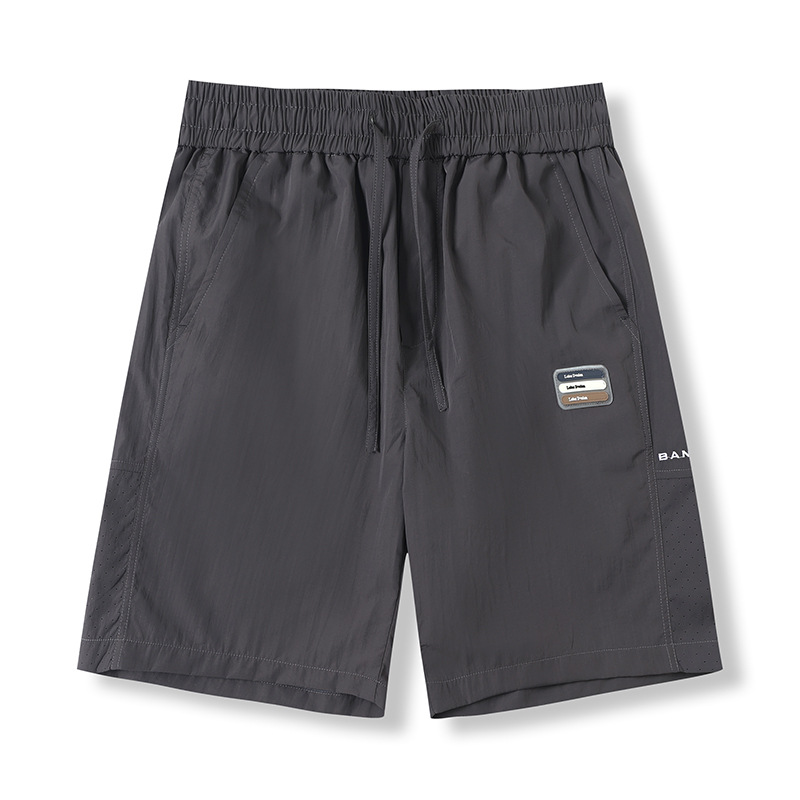 Pantalones deportivos cómodos y transpirables, pantalones cortos casuales simples, pantalones cortos al aire libre delgados y sueltos de verano para hombres.