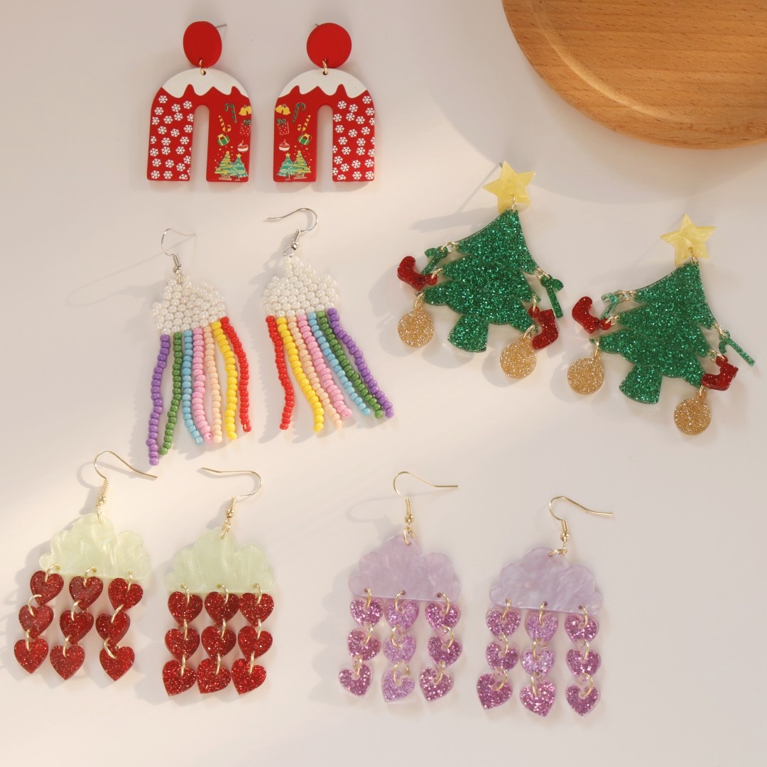 acrylic brand earrings with tassels