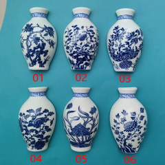 花瓶の冷蔵庫は青と花の磁器の陶磁器の冷蔵庫を貼って梅蘭竹菊のパンダの万里の長城の中国風の観光工芸品を貼ります。