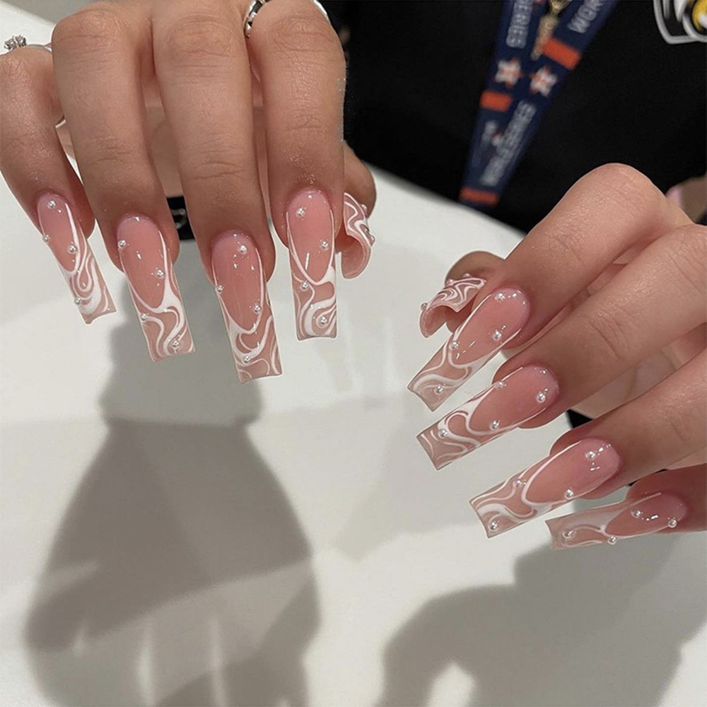 Comercio extranjero venta en caliente de uñas largas al por mayor ondulación de agua blanca francesa para usar uñas falsas parches de uñas europeas y estadounidenses