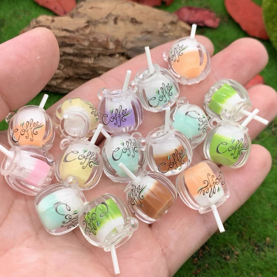 Suministro directo de fábrica de dos colores taza de café luminosa DIY accesorios para el cabello llavero mochila colgante material al por mayor diadema hecha a mano