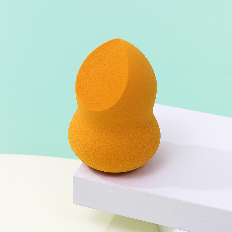 Fábrica personalizada cortar un cuchillo de polvo de maquillaje de huevo no comer polvo en forma de calabaza de poliuretano esponja de maquillaje de huevo de maquillaje