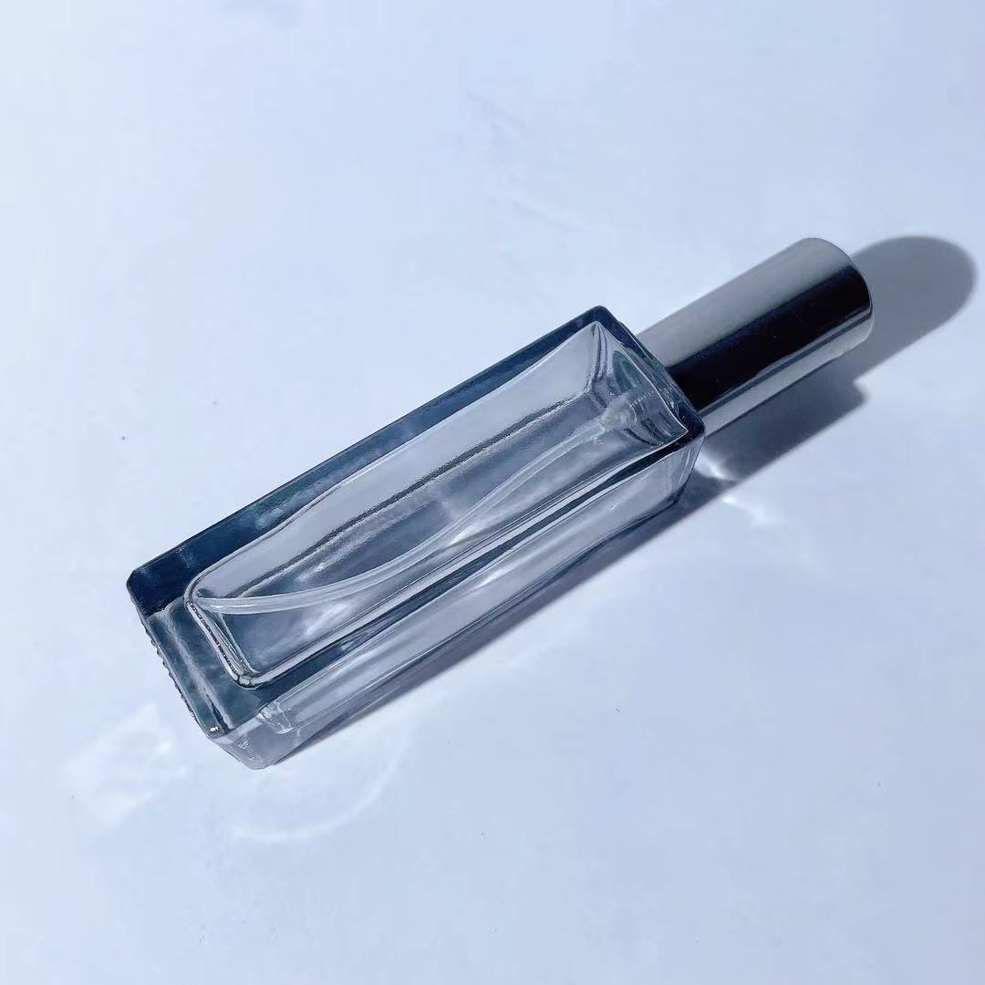 Muestra de perfume sub-botella de alta gama botella de aerosol portátil 10ml de vidrio avanzado sub-contenedor 5ml mini botella vacía