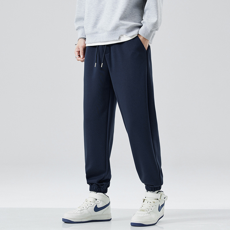 2025 otoño y invierno pantalones deportivos de pies de hombre pantalones de punto de gran tamaño sueltos pesados juveniles casual pantalones de moda image 1