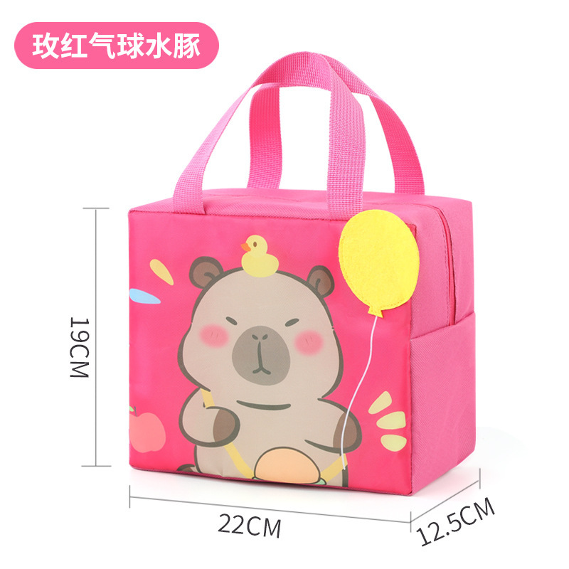 保温弁当箱は昼食バッグを持って外出して食事保温バッグを持ってアルミ箔を厚くしてシンプルな風保温弁当箱袋を持っている|undefined