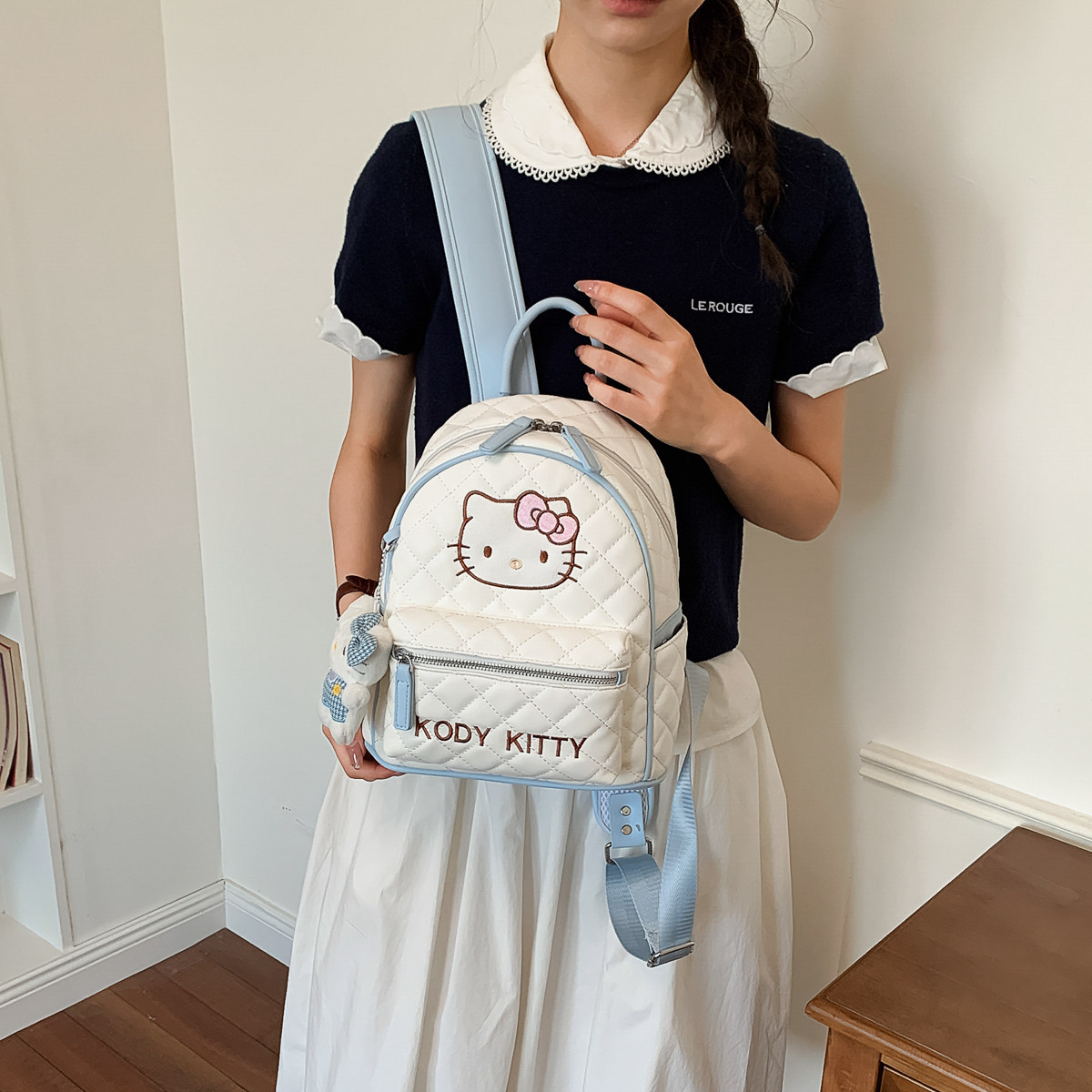 Liebre mochila de estudiantes coreana 2026 mochila popular femenina de dibujos animados versátil nuevo estilo de viento de gran capacidad para viajar a la niña
