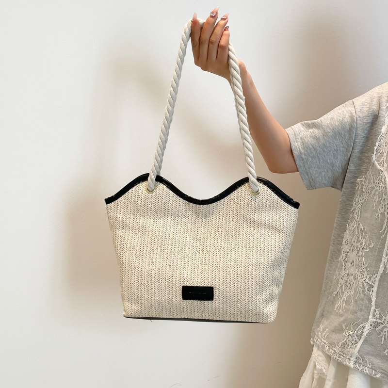 Bolso femenino transfronterizo tejido simple y moderno casual todo-fósforo bolso de paja portátil bolso de axila de un solo hombro bolso de alta capacidad