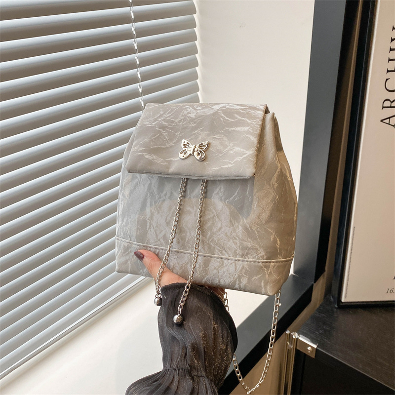 Borso de mariposa hueco de moda 2024 nuevo color sólido simple estilo de cadena de textura extranjera nicho de moda bolso de hombro