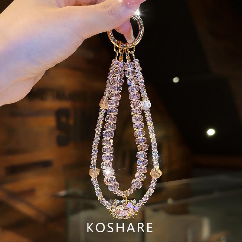 Honey Peach Cat Flash Diamond cadena de teléfonos móviles ligera de lujo nicho de alta calidad bolsos de cristal colgante colgante de mano lindos dibujos animados