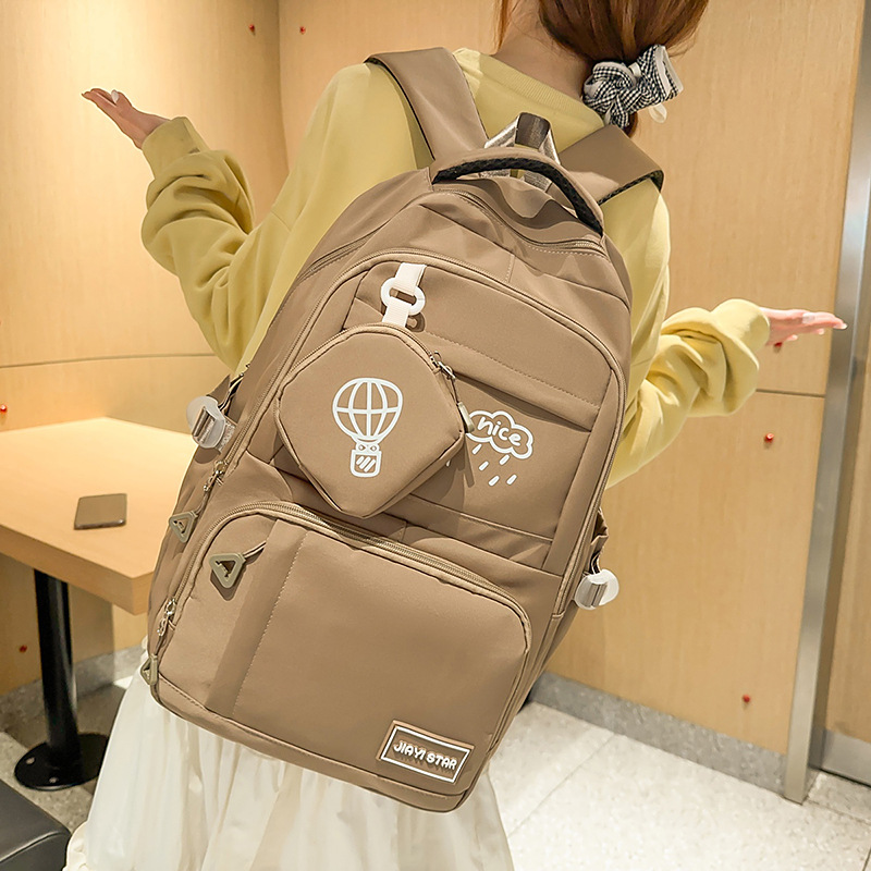 Mochila japonesa de moda, mochila ligera de viaje de gran capacidad, mochila casual coreana, mochila de estudiantes de secundaria.