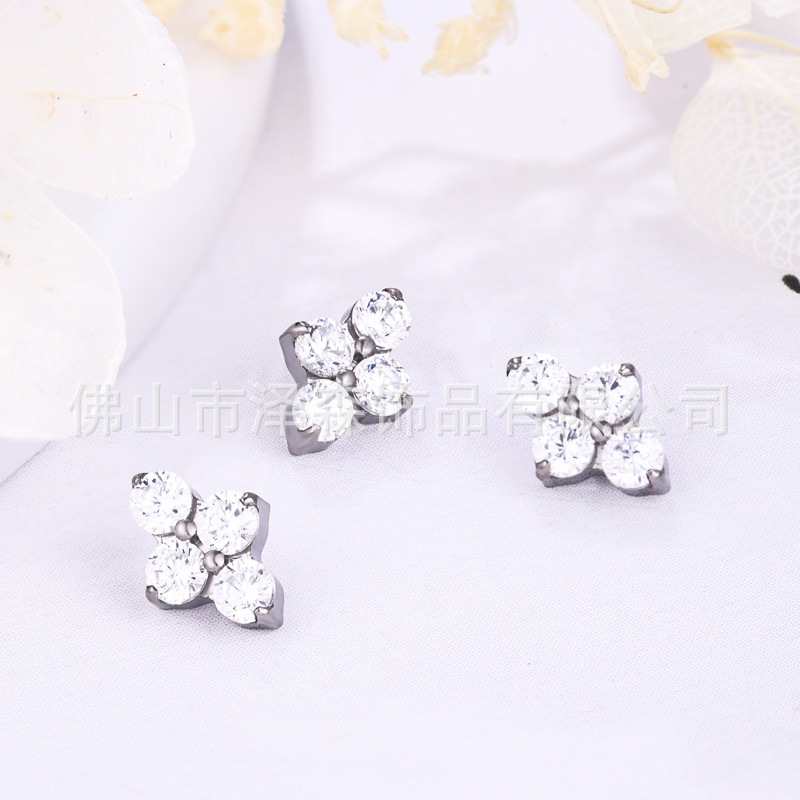 Silver pointed spike labret stud material detail