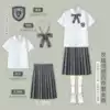 Female white short sleeves + dark gray midi skirt + yellow plaid bow tie + JK badge