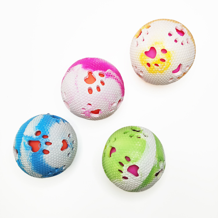 Fábrica al por mayor nueva huella hueca hueso sonido bola mordedura-resistente TPR color mezclado bola elástica de goma juguete para mascotas