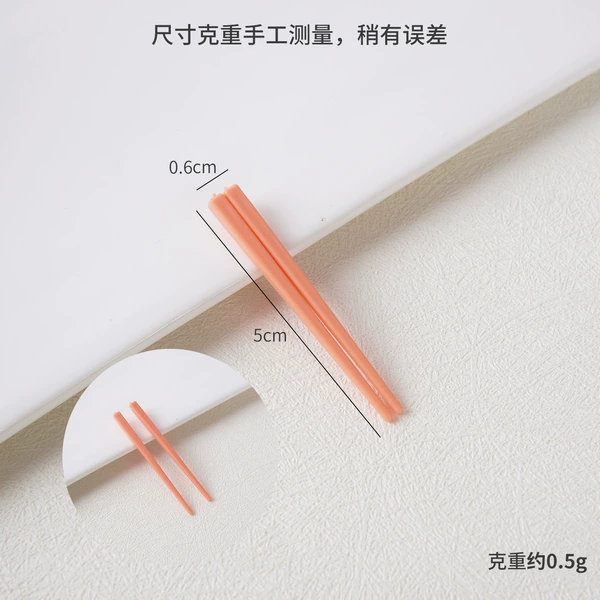 Small orange detachable chopsticks