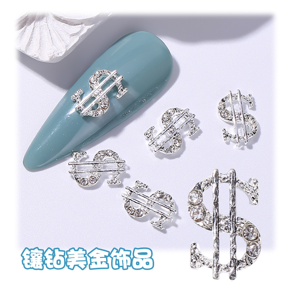 Joyería de uñas transfronteriza oro plata dólar símbolo moneda símbolo de uñas Luz de lujo flash diamante tridimensional decoración de diamantes