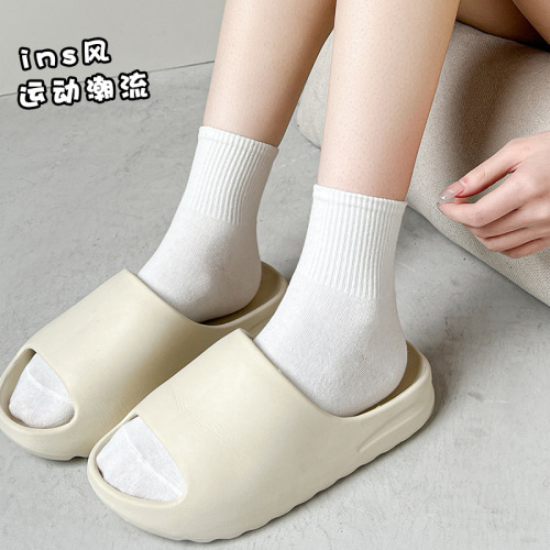 2024 white socks for women spring and autumn cotton double-section elastic waistband mid-calf socks ins trendy solid color sports socks