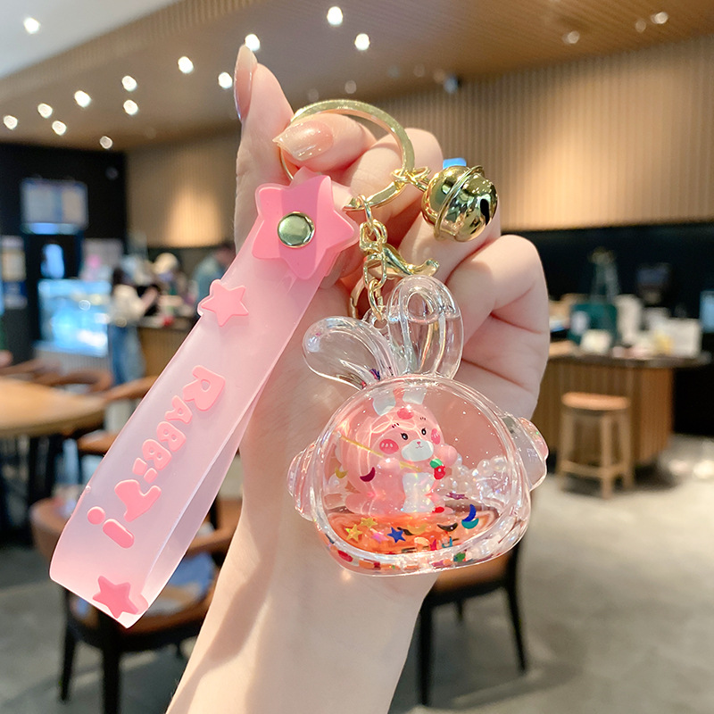 Linda bolsa de fresa de aceite llavero de conejo exquisito colgante de botella de deriva colgante de bolsa de coche colgante pequeño regalo al por mayor
