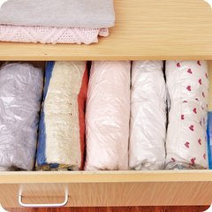 Handscroll-style clothing and bedding vacuum compression bag, roll-press vacuum storage bag