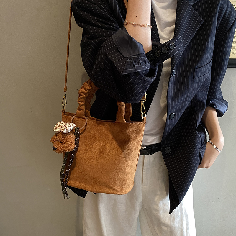 Moda leopardo bolso de niña lindo perro colgante mochila de niño otoño y invierno nuevo bolso de niños de peluche