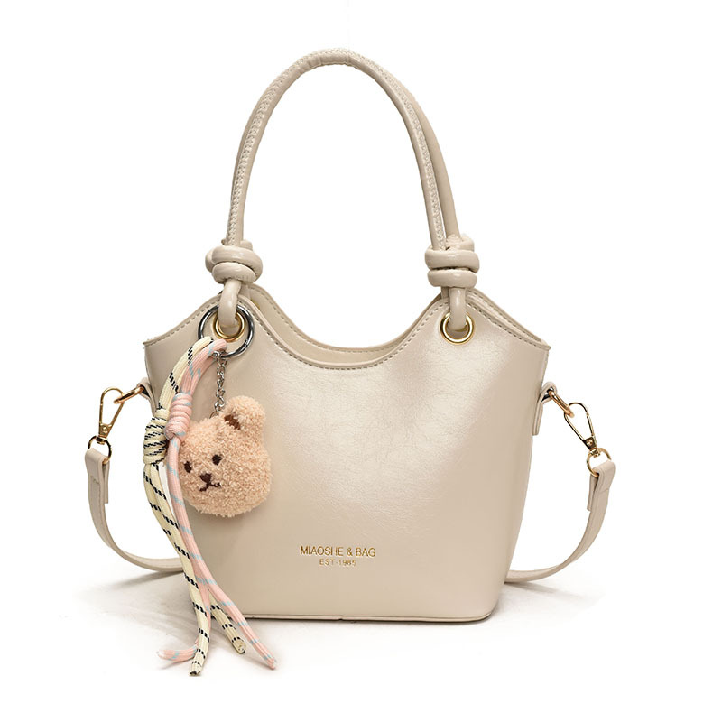 Popular ultra caliente bolso de cubo de mano para mujeres 2025 nuevo nicho Zhong universal bolso de viaje casual simple mochila de hombro