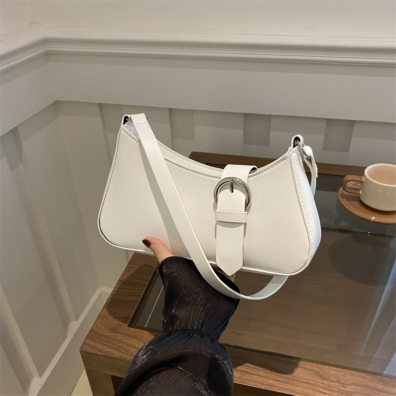 Bolso de axila para mujer 2024 nuevo bolso de mensajero de alto valor de un solo hombro diseño de nicho francés textura bolso de palo francés bolso femenino