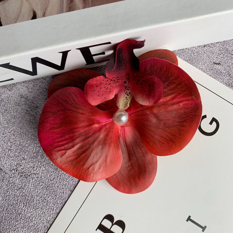 絹布の胡蝶蘭の花の頭は花の壁の部品の花の材料の頭をシミュレーションして髪を飾ってdiyの手作りの結婚祝いの贈り物を挟んで造花を飾ります。|undefined
