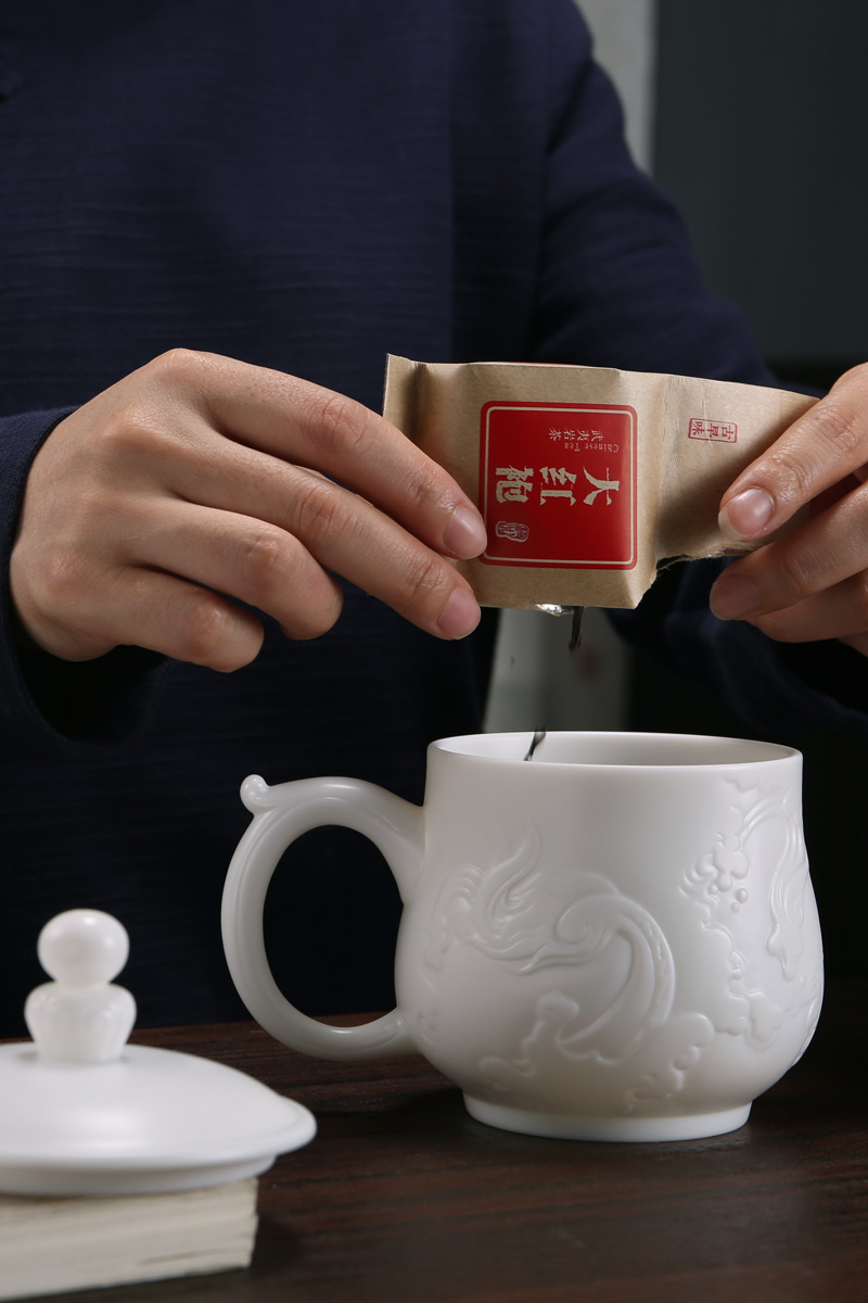 Barro sabor grasa de oveja Jade porcelana blanca cayendo Dragón shengshi Oficina grande Taza agua cerámica con tapa regalo empresa taza té