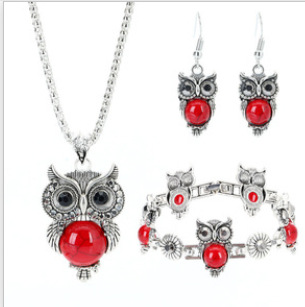 Europea y americana retro joyería traje turquesa incrustaciones búho colgante pendientes collar pulsera joyería de moda femenina