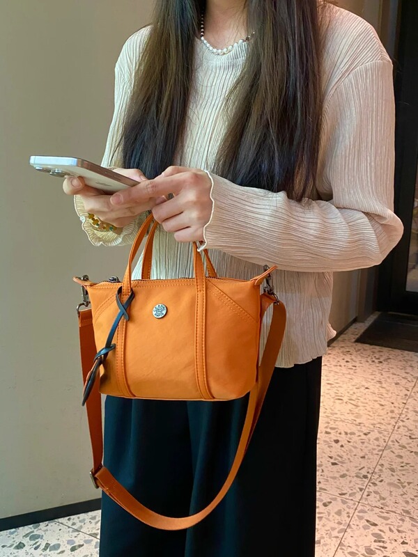 HB 2025 新しいバッグ餃子バッグ女性のショルダーハンドヘルドクロスボディバッグファッショナブルな防水携帯電話バッグ多用途|undefined