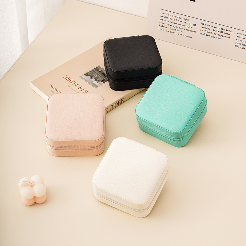 Transfronteriza mini caja de joyas portátiles pequeñas en la caja de joyas pu simple viaje collar pernos caja de joyas caja de almacenamiento