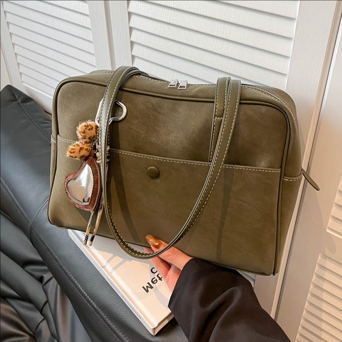 Bolsa de bolos de alta sensación para mujeres otoño / invierno 2025 nueva gran capacidad de transporte de hombro bolsa de mano bolsa de almacenamiento