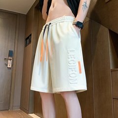 氷の糸の通気性の夏の半ズボンの男性の潮のブランドのアルファベットのエンボスの5分のカジュアルなズボンの男性の青少年の運動の中でズボン