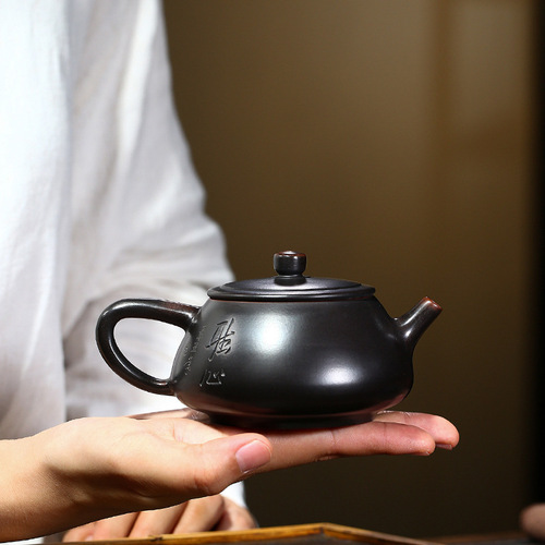 Manufacturer supplies creative purple clay pots, Nixing pottery, stone ladle pots, hand-engraved household tea sets, one-piece drop shipping