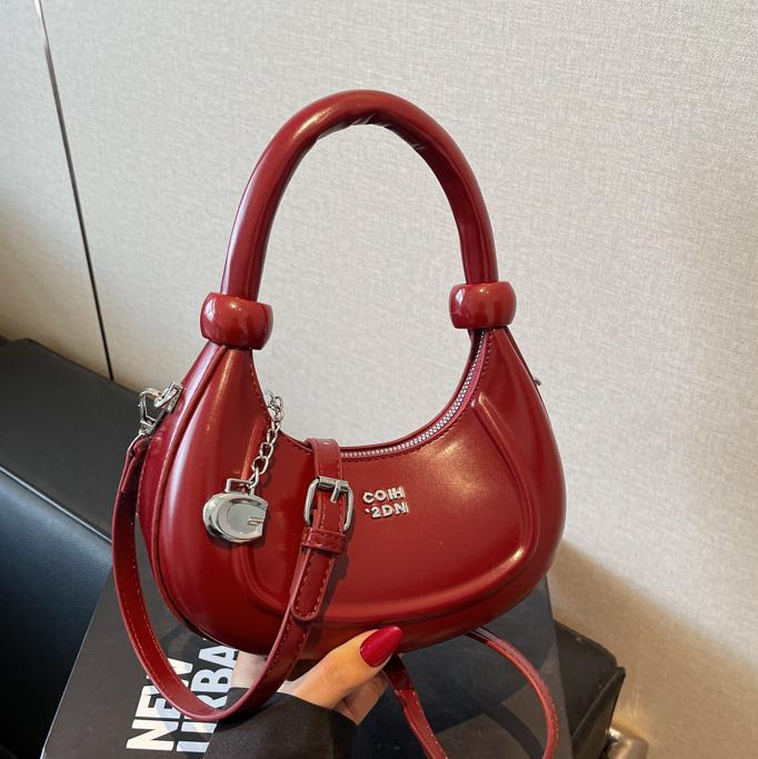 Bolsos de diseño de nicho de tendencia transfronteriza para mujer 2025 nuevo bolso de hombro retro salvaje bolso de axila de moda occidental
