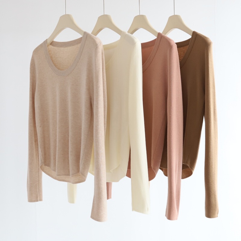 Autumn and winter wool blended hem curved knitted top women's U-collar buy a wild temperament soft waxy base shirt Autumn and winter wool blended hem curved knitted top women's U-collar buy a wild temperament soft waxy base shirt