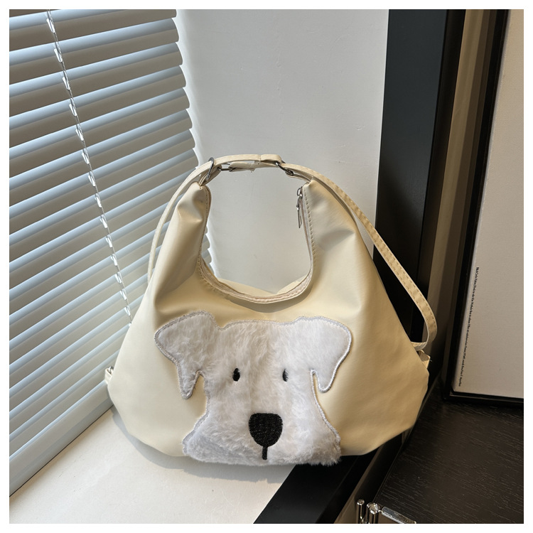 The new autumn and winter 2024 fashion cartoon backpack with simple, individual and niche design, single-shoulder bag and commuter tote bag undefined