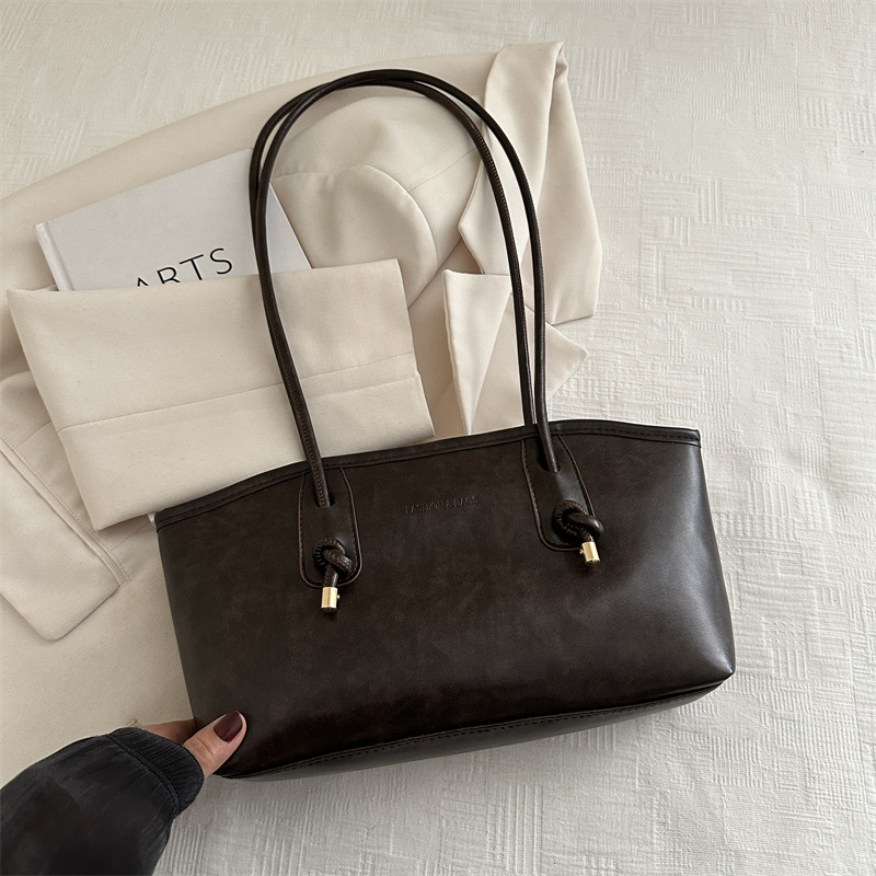 Bolso Tote de estilo occidental de alta gama para mujer 2024 nuevo bolso de cercanías de nicho popular versión coreana bolso de axila de un solo hombro de gran capacidad