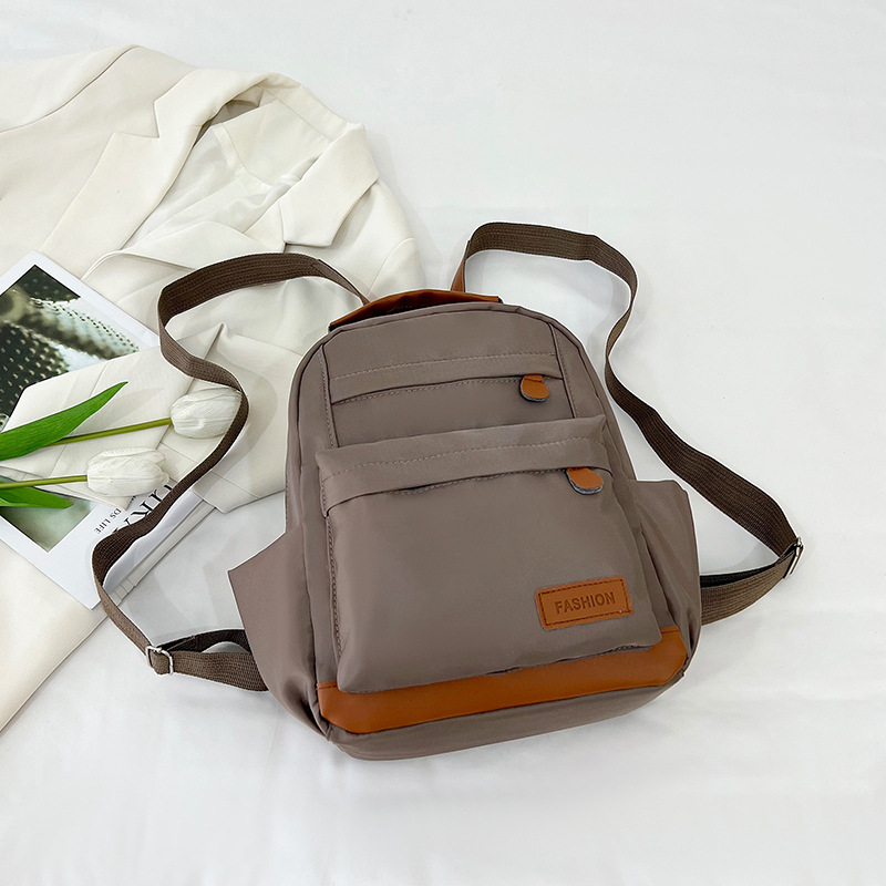 2025 primavera nueva mochila simple de color sólido mochila de estudiantes de escuela primaria mochila de viaje al aire libre