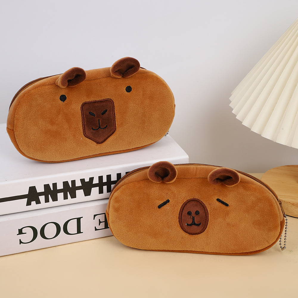 Bolso de lápices de felpa Kapibala de estilo explosivo Bolso de papelería para niños de carpincho de dibujos animados de gran capacidad Bolso de almacenamiento de suministros escolares